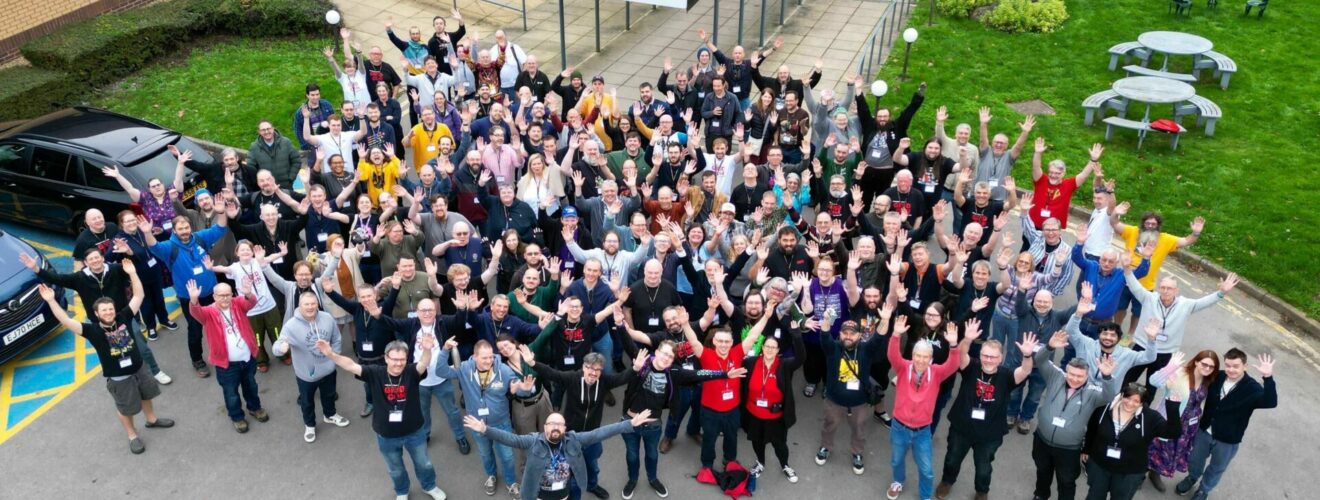 An overhead photo of the Gaming Rules patreon supporters, grouped outside the hotel