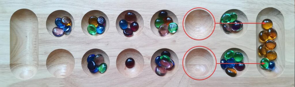 mancala board capturing stones