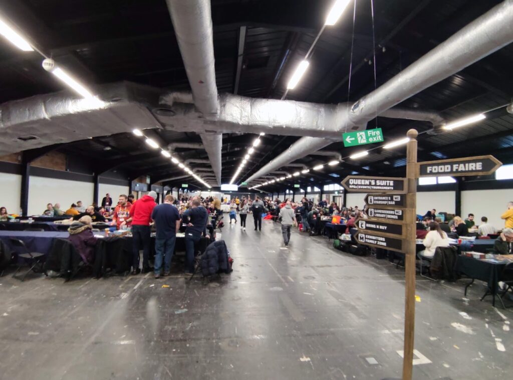 one of the Airecon halls, with a directional sign in the foreground